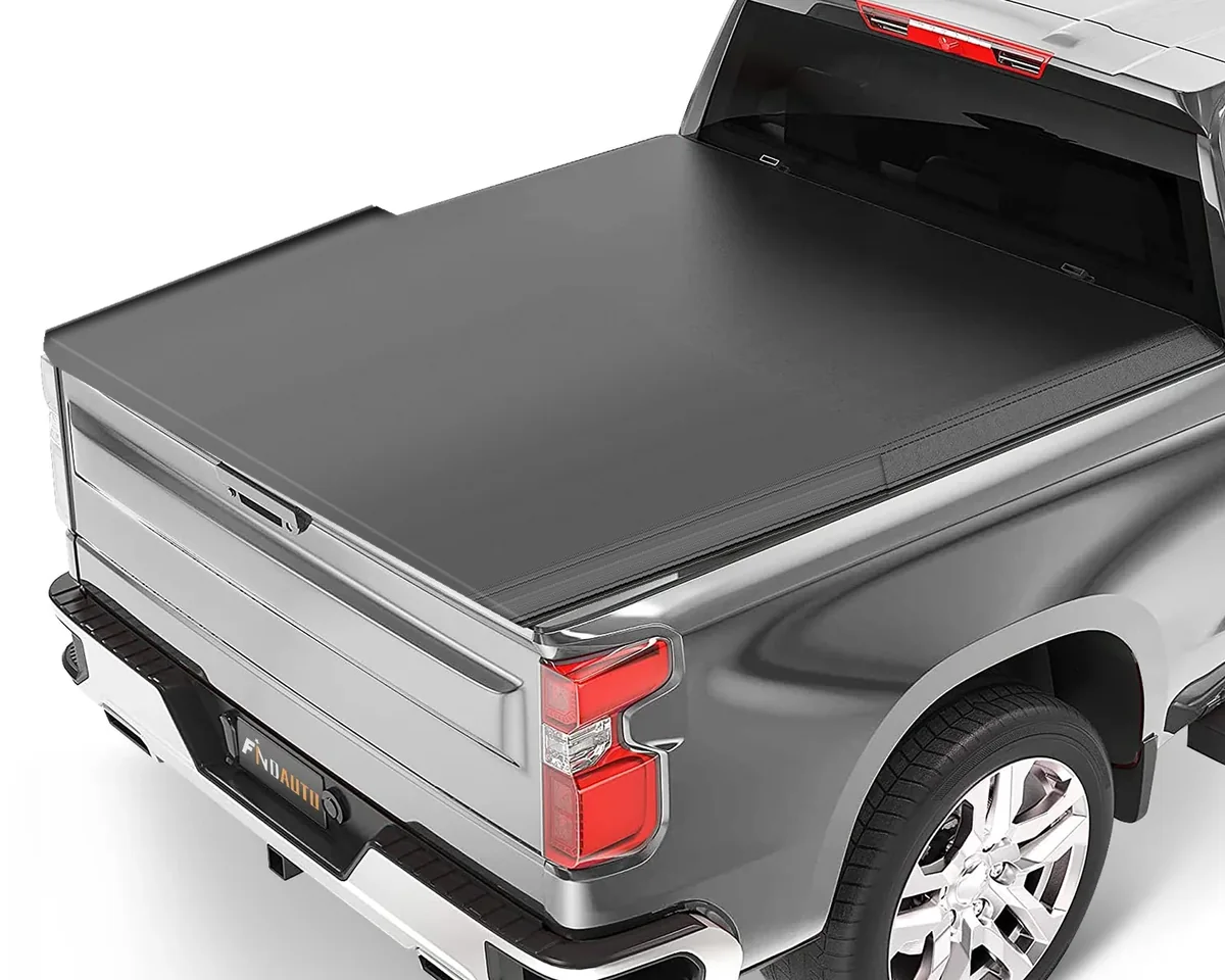 A FINDAUTO soft folding tonneau cover closed over a pickup truck bed from cab to tailgate